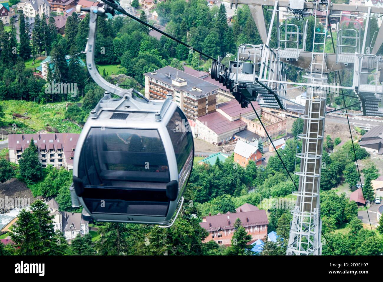cable car on a mountain slope cable cars running up and down Stock Photo