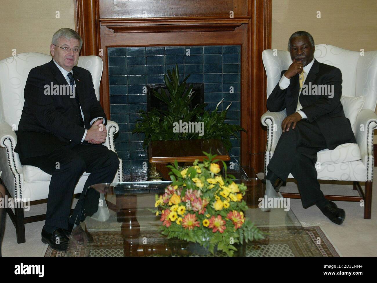 South African President Thabo Mbeki (R) sits with Joschka Fischer (L) Vice-Chancellor of Germany after their meeting at the Union Building in Pretoria October 31,2003.Fischer is on two-days official visits to South Africa.REUTERS/Juda Ngwenya REUTERS  JN/ Stock Photo