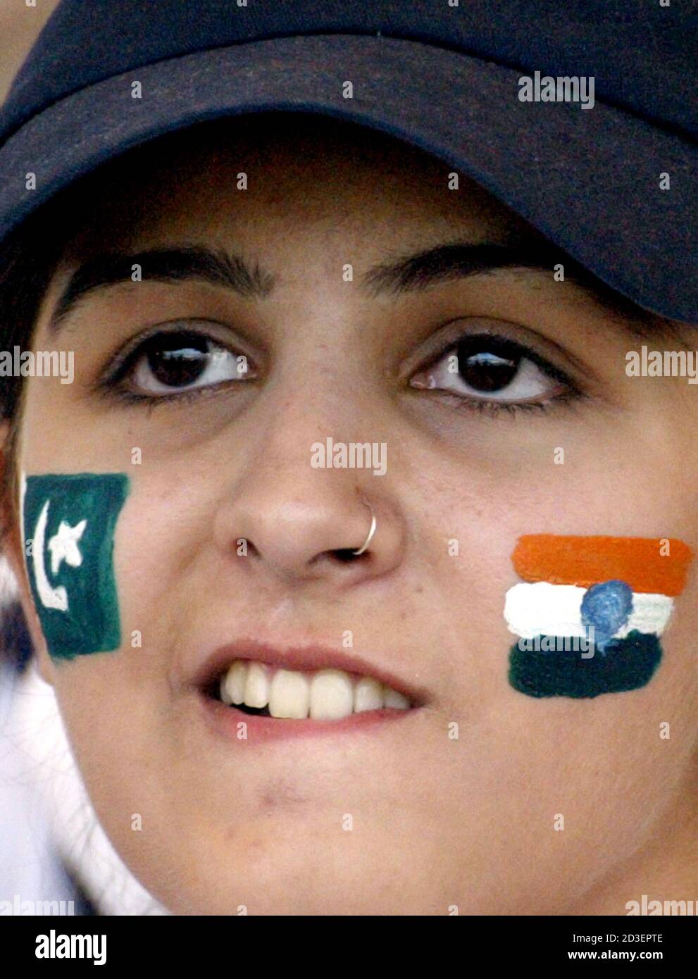 A Pakistani Cricket Fan With Her Face Painted With Pakistan And Indian Flags Watches Third And Final Test Match In Rawalpindi A Pakistani Cricket Fan With Her Face Painted With Pakistan L A Pakistani Cricket Fan With Her Face Painted With Pakistan And Indian Flags Watches Third And Final Test Match In Rawalpindi A Pakistani Cricket Fan With Her Face Painted With Pakistan L