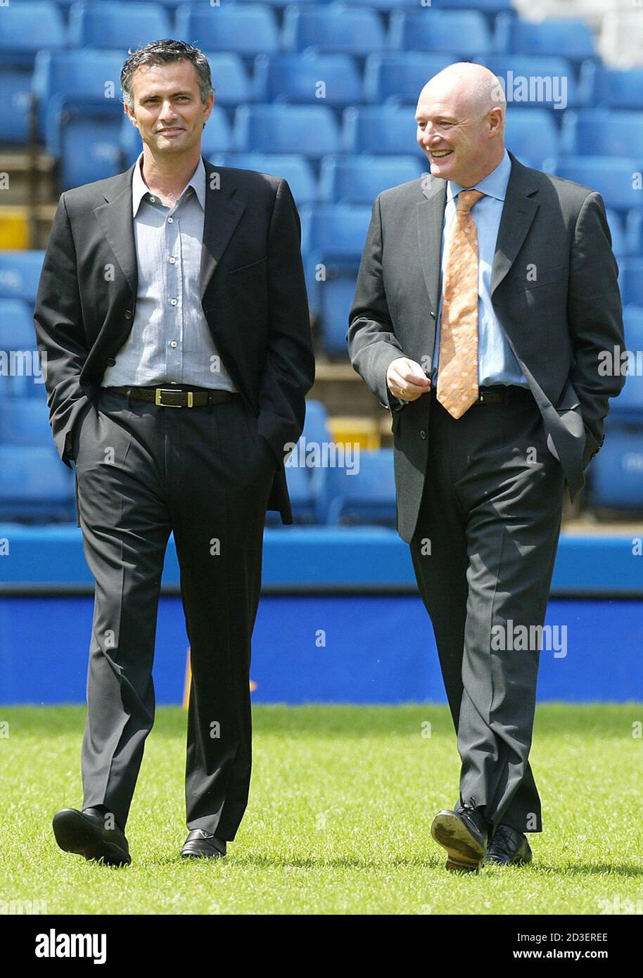 New Manager Of Chelsea Football Club Jose Mourinho L Walks On The Pitch At Stamford Bridge With Chelsea Chief Executive Peter Kenyon R In London June 2 04 Mourinho 41 Began On New Manager Of Chelsea Football Club Jose Mourinho L Walks On The Pitch At Stamford Bridge With Chelsea Chief Executive Peter Kenyon R In London June 2 04 Mourinho 41 Began On