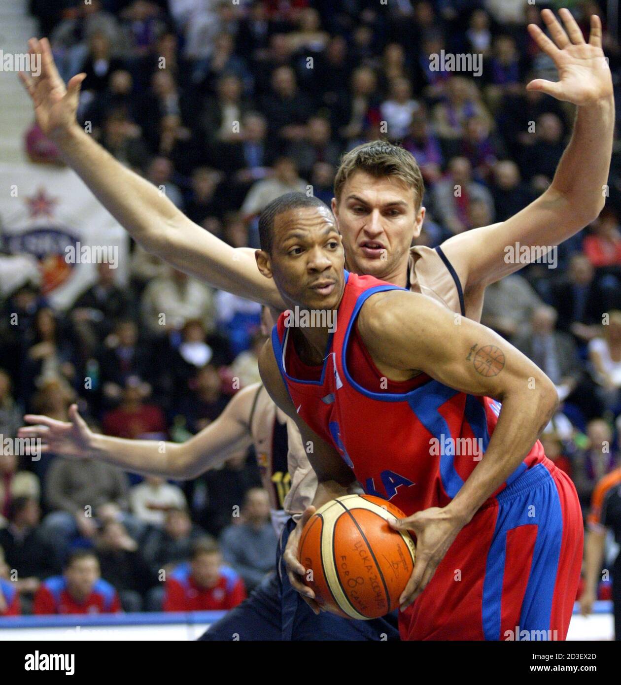 Zizic of FC Barcelona tries to block Brown of CSKA Moscow during the  Basketball Euroleague Top 16 group E match in Moscow. Andrija Zizic (R) of  FC Barcelona tries to block Marcus