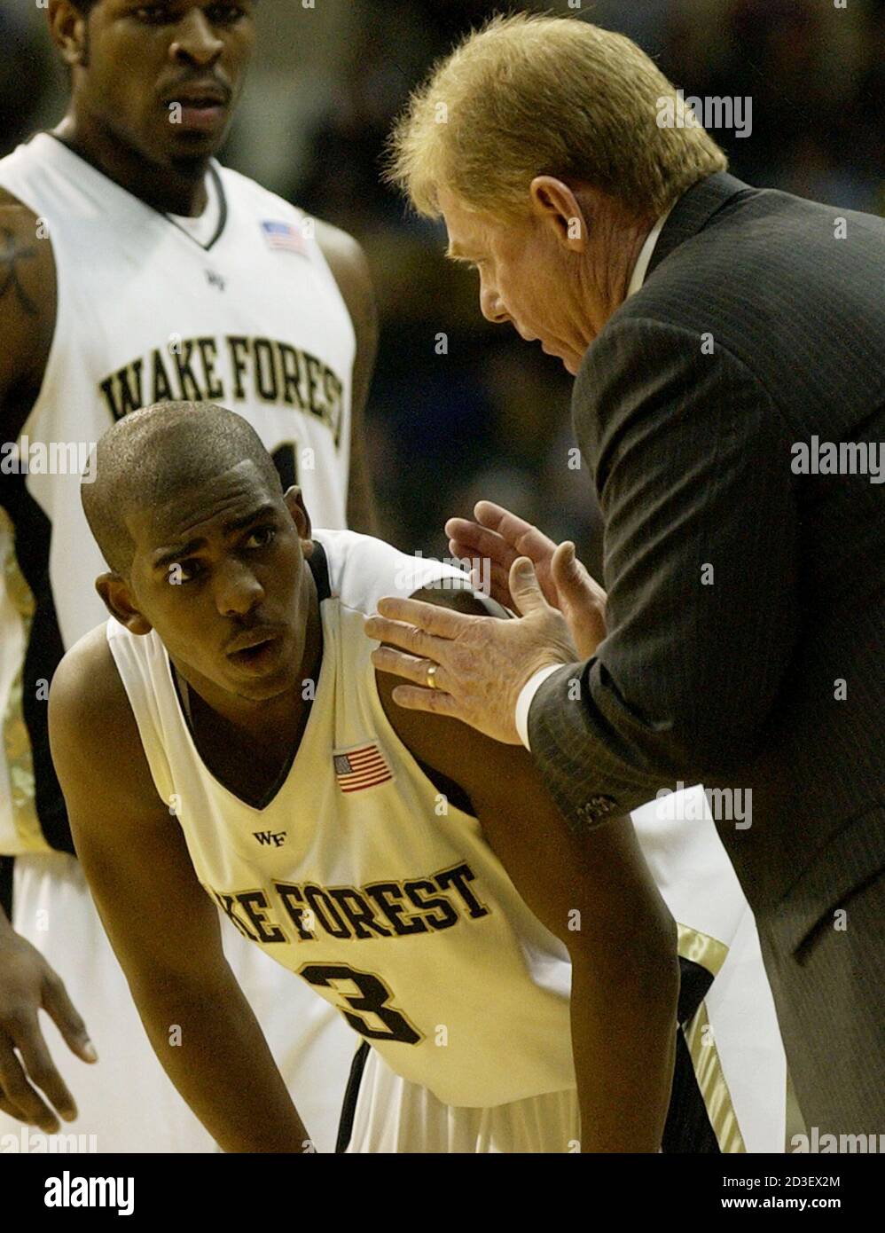 wake-forest-head-coach-skip-prosser-talks-with-chris-paul-in-the-second-half-of-game-with-the-university-of-tennessee-chattanooga-at-the-cleveland-state-university-wolstein-center-in-cleveland-ohio-march