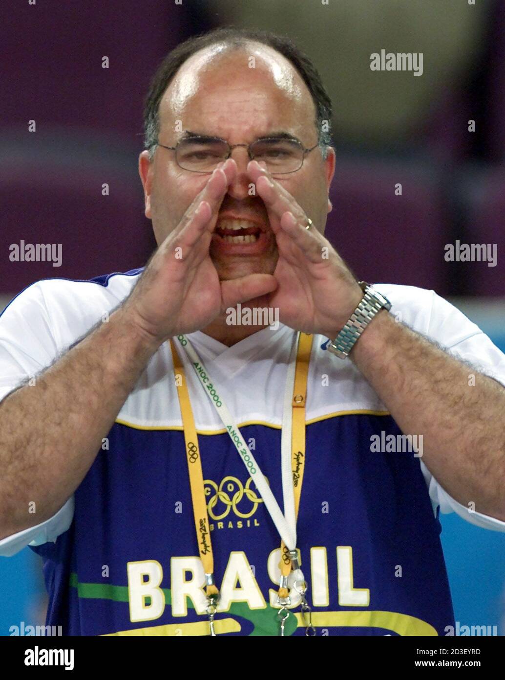 Brazilian coach Radames Lattari screams with players at the quarter final match against Argentina during the volley competition at the Sydney 2000 Olympic Games, September 27, 2000. Argentina beat Brazil 17-25 25-21 25-19 27-25 and advance to the semifinals.  PW Stock Photo