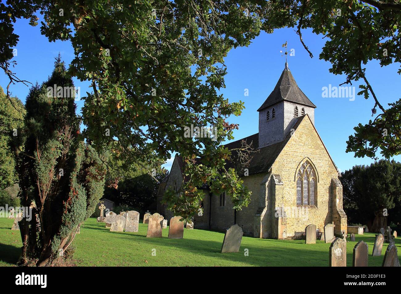 The Parish Church of St Mary and All Saints Dunsfold, Surrey, England Stock Photo