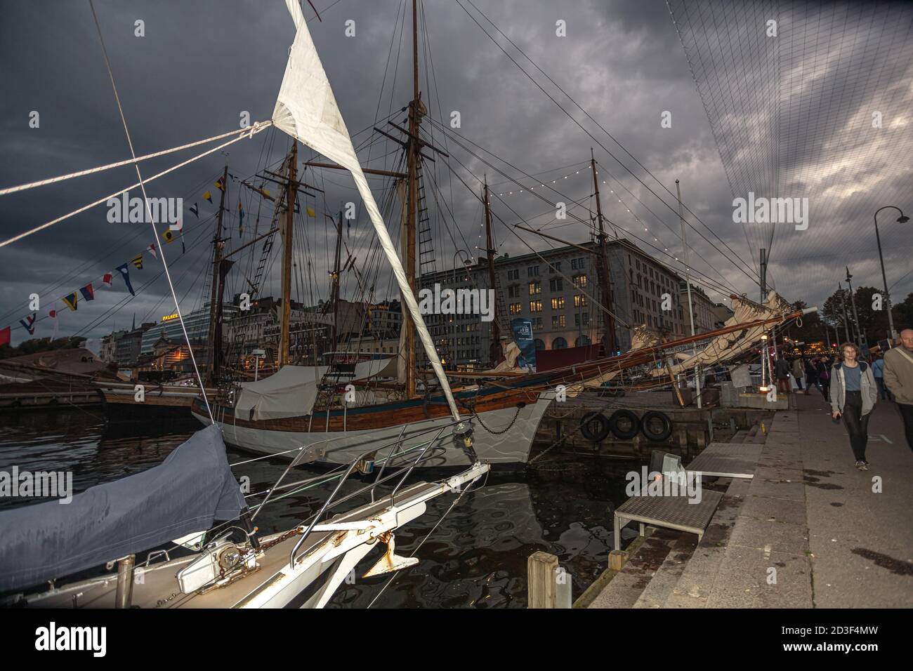 Helsinki, Uusimaa, Finland October 7, 2020 Moored boats and yachts at the Market Square to take part in the traditional delicatessen fair. Evening time. High quality photo Stock Photo