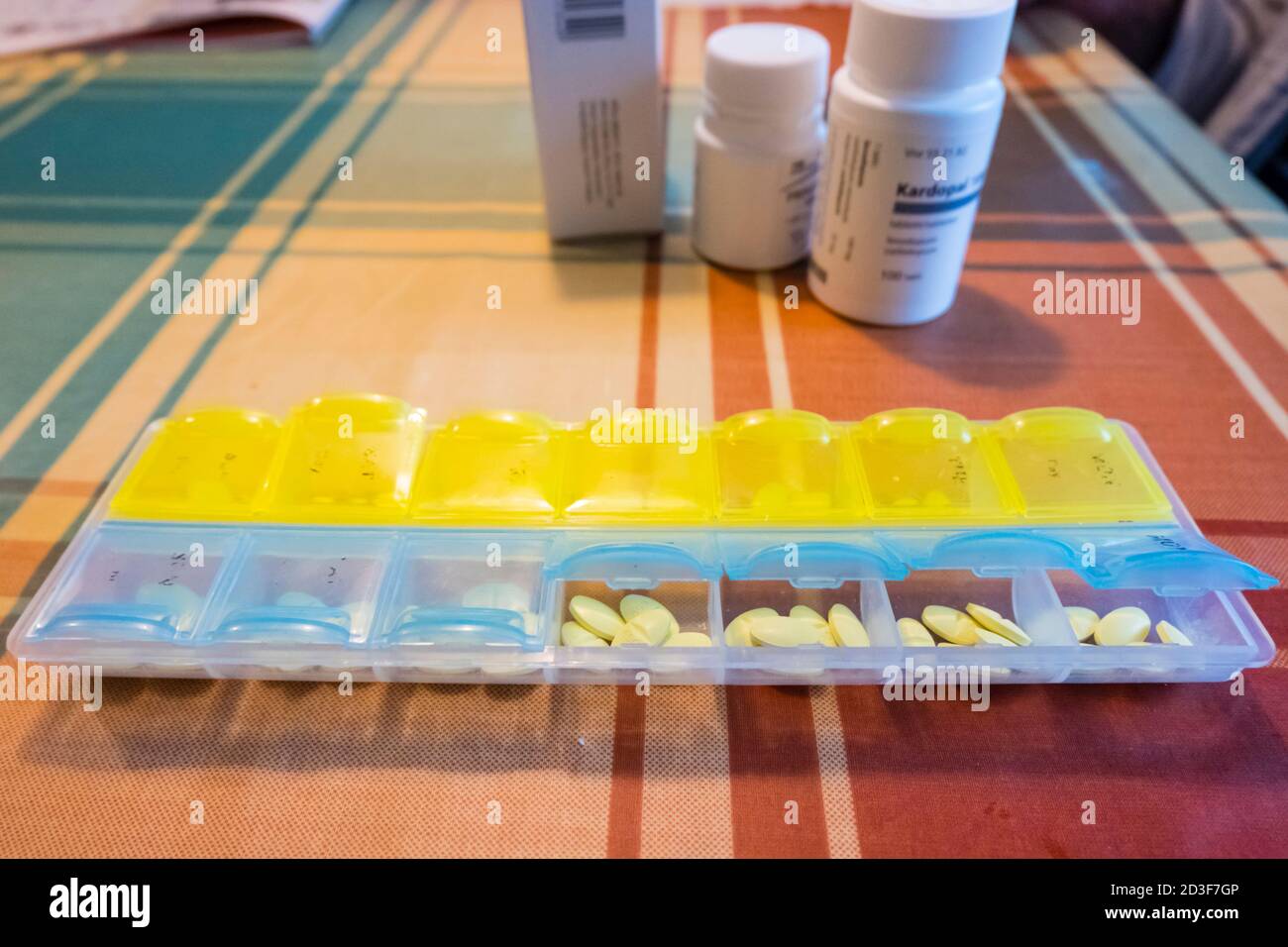 Medications for 2 weeks in a pill organiser Finland Stock Photo