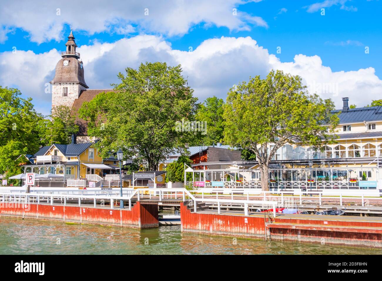 Seaside with restaurants and church, old town, Naantali, Finland Stock Photo