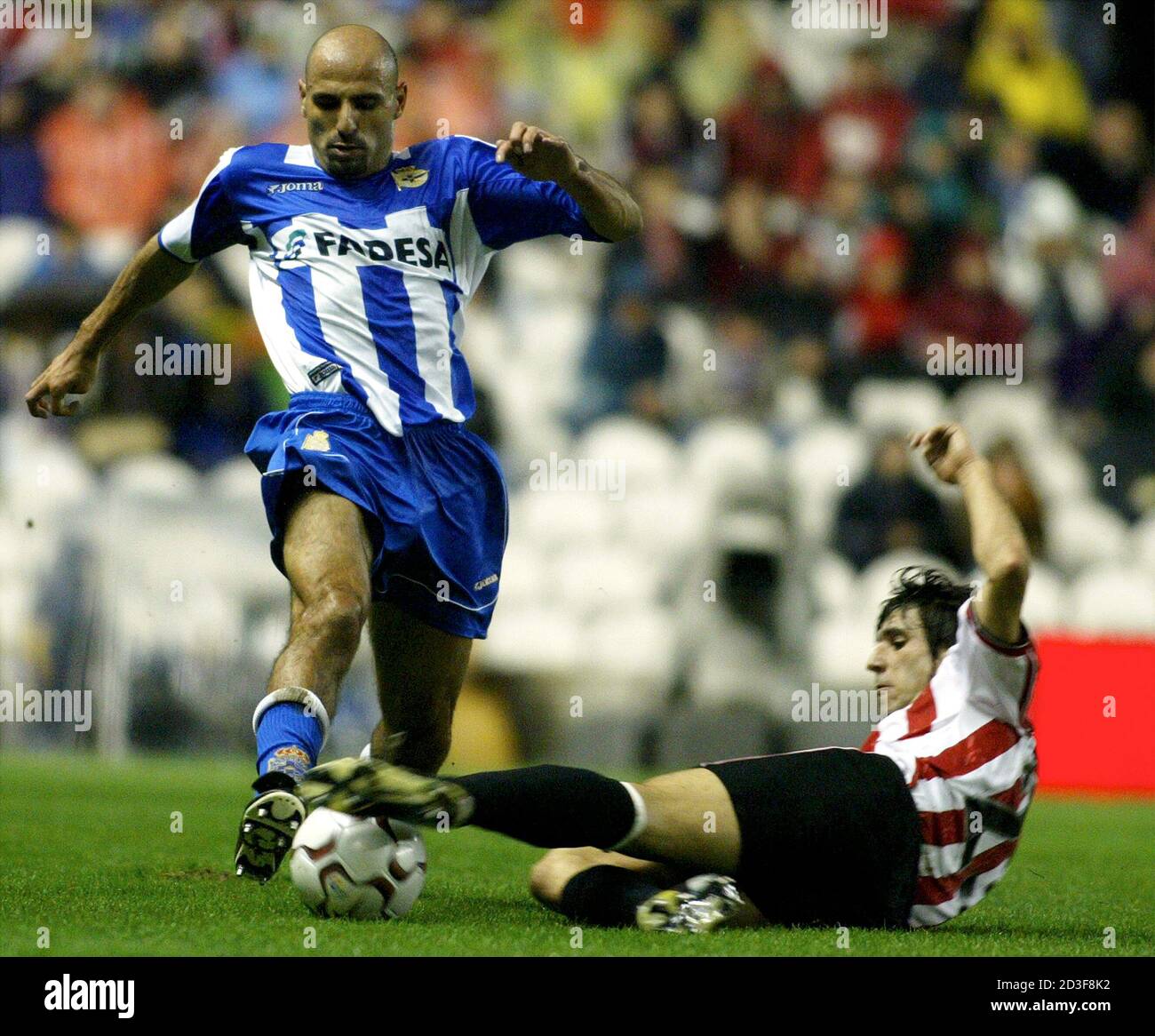 Slide tackles hires stock photography and images Alamy