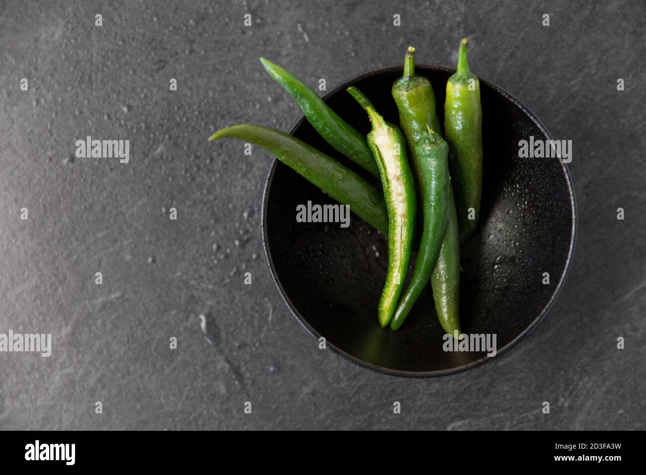 Chili peppers in cup hi-res stock photography and images - Alamy