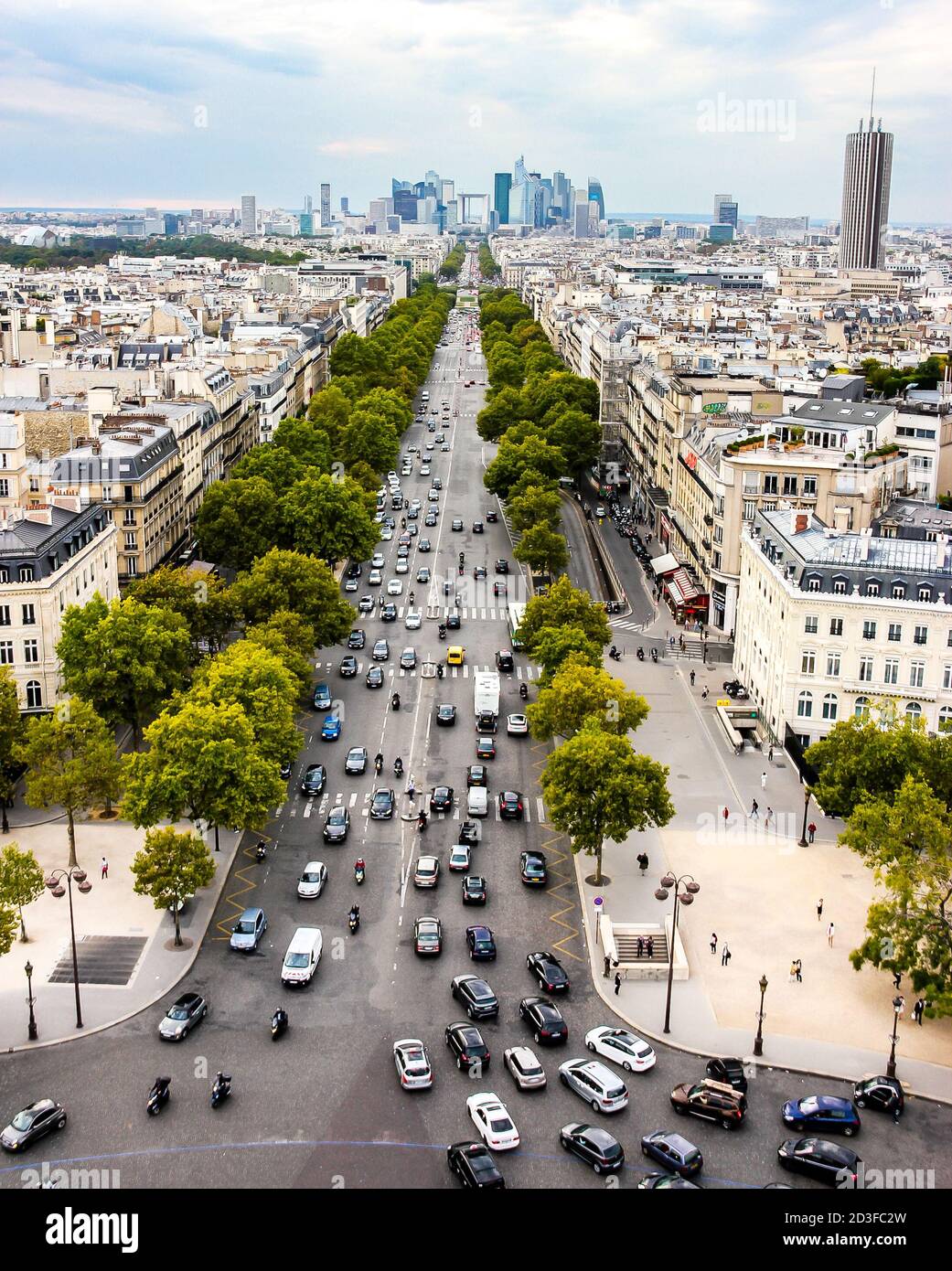 M I C H E L L E M Λ Y | Standing before the iconic Arc de
