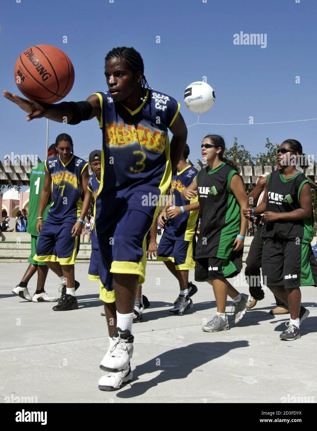 Street basketball player performs before first Brazilian Street Basketball  league championship in Rio de Janeiro. A street basketball player performs  before the first Brazilian Street Basketball league championship in Rio de  Janeiro