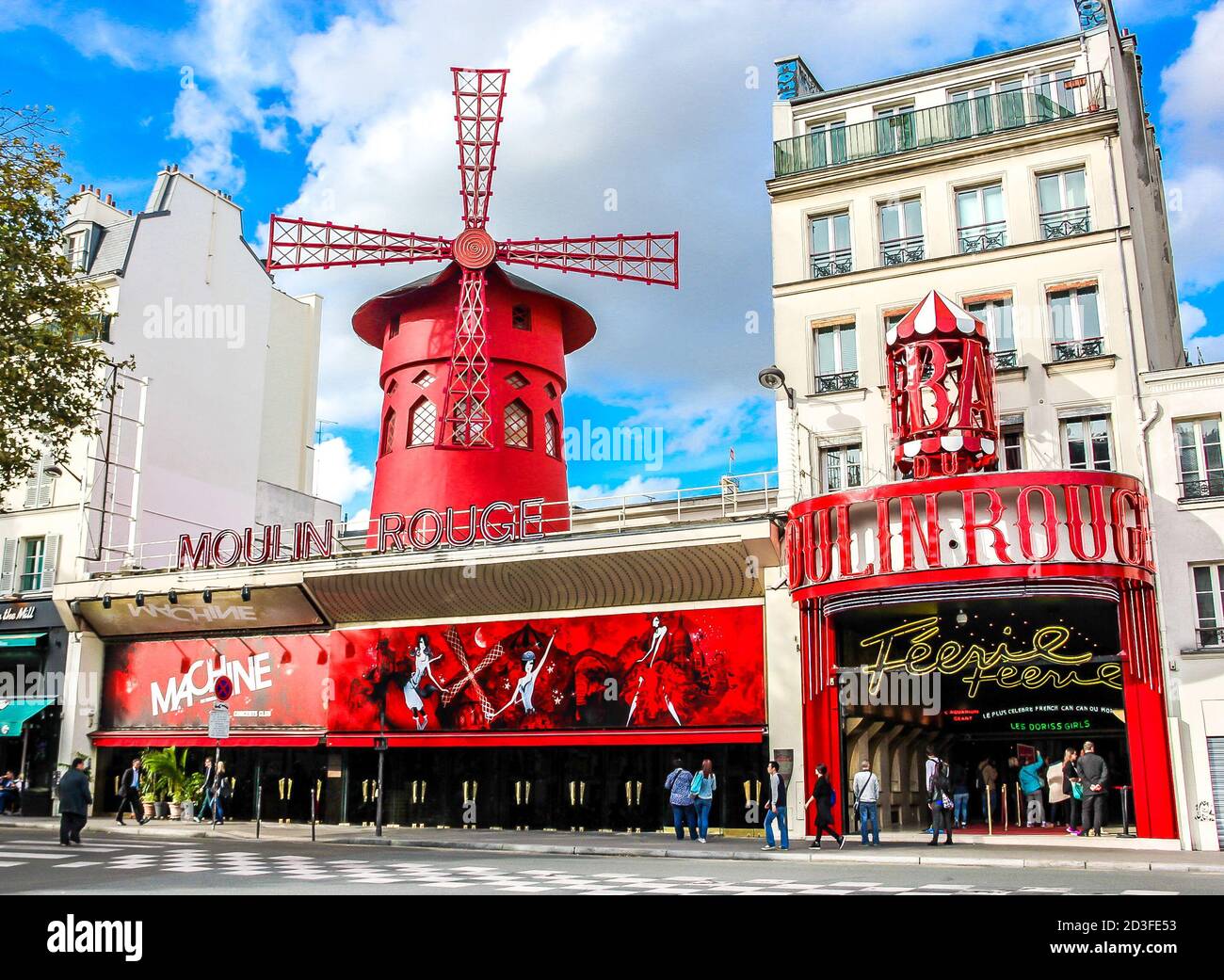 Moulin Rouge is a famous cabaret in the Paris red-light district of Pigalle. France Stock Photo