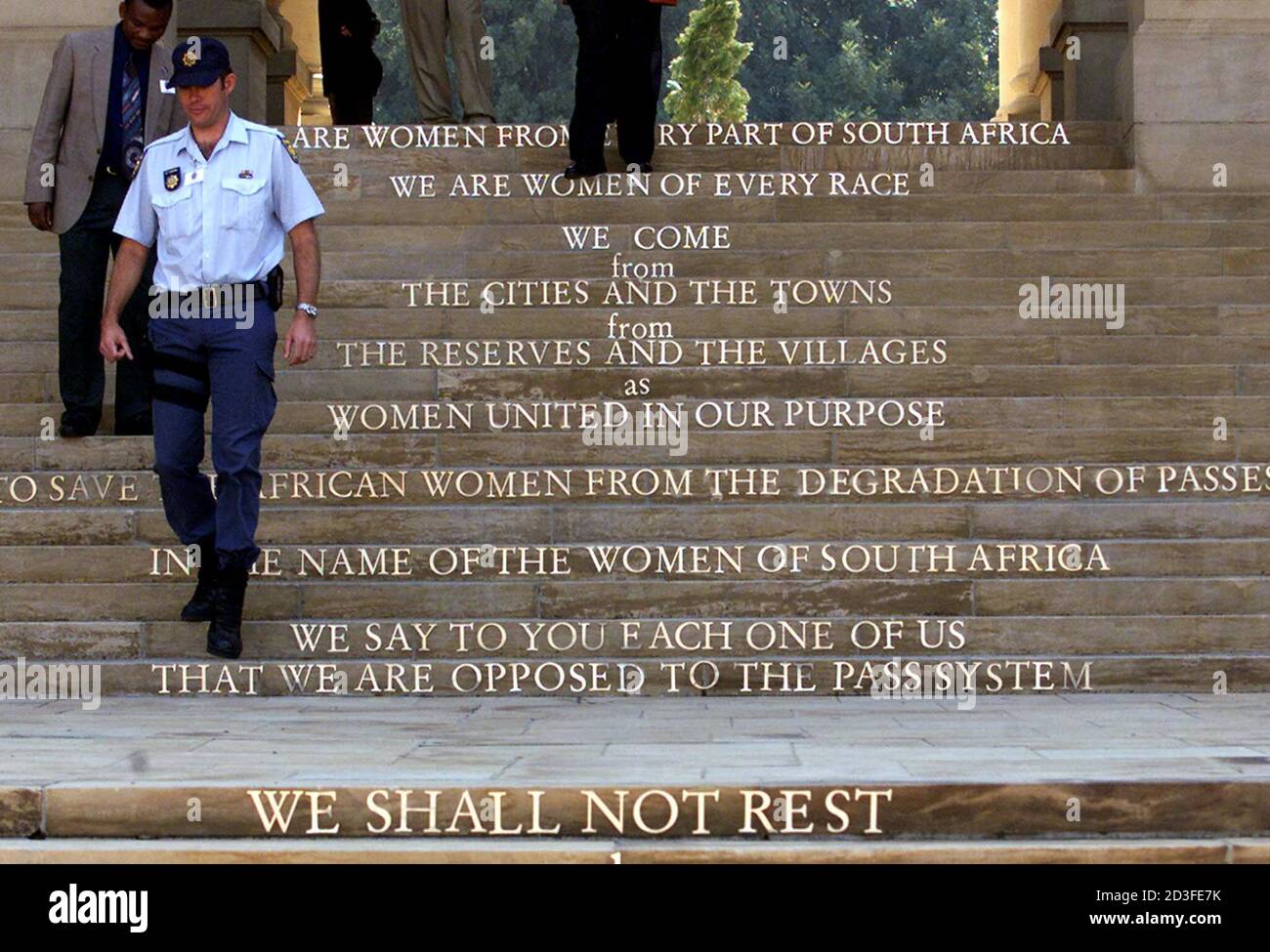 A South African Policeman Descends Stairs From A Memorial To Black Women Who Marched Against Apartheid And The Anti Black Pass Laws In 1956 The Stairs Carry As An Inscription The Text Of