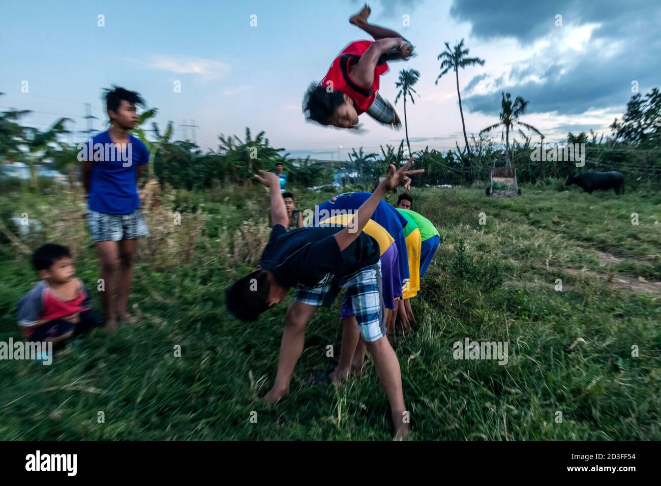 traditional luksong Baka game in the Philippines Stock Photo