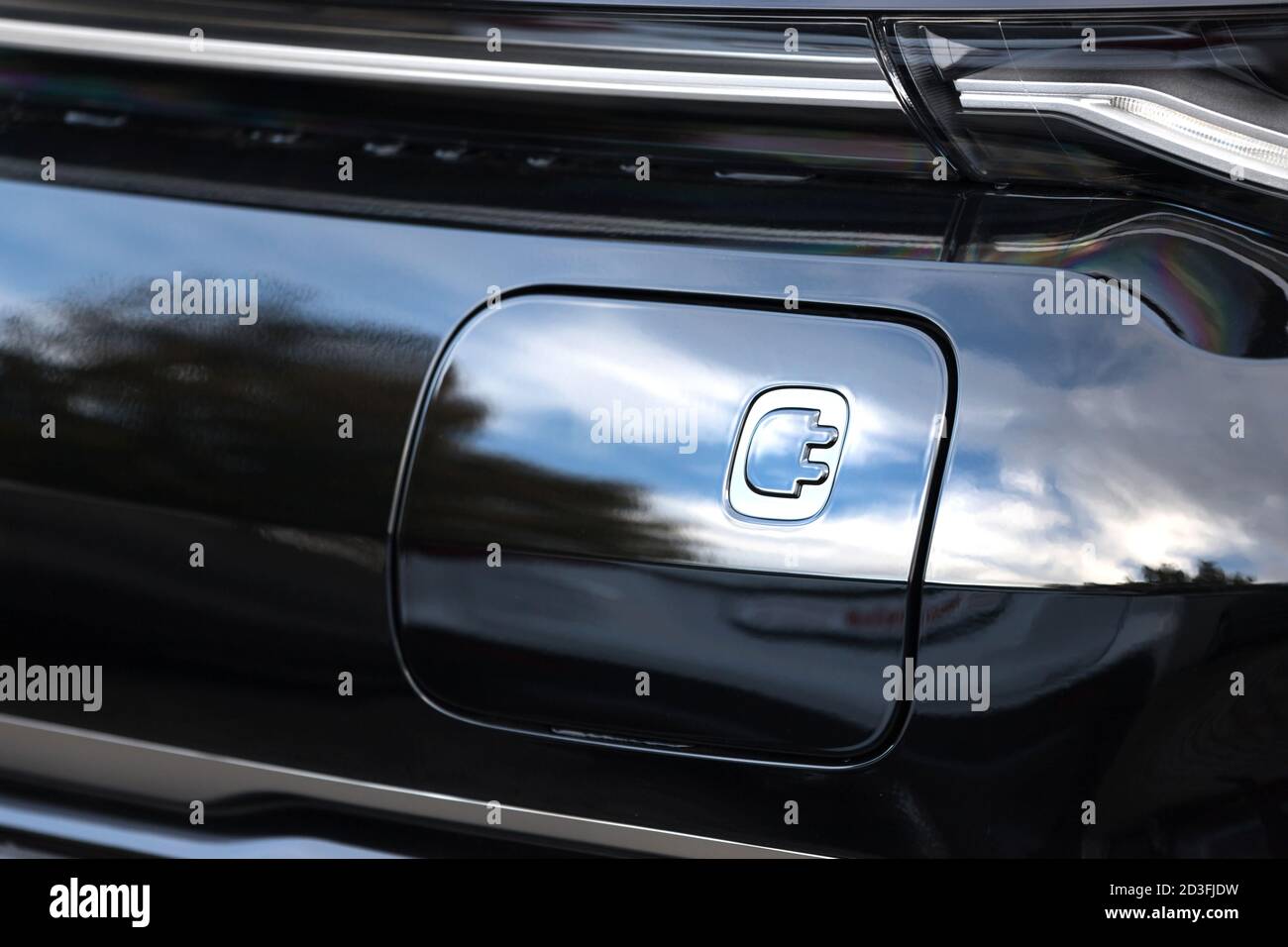 modern loading flaps of an electric car Stock Photo - Alamy