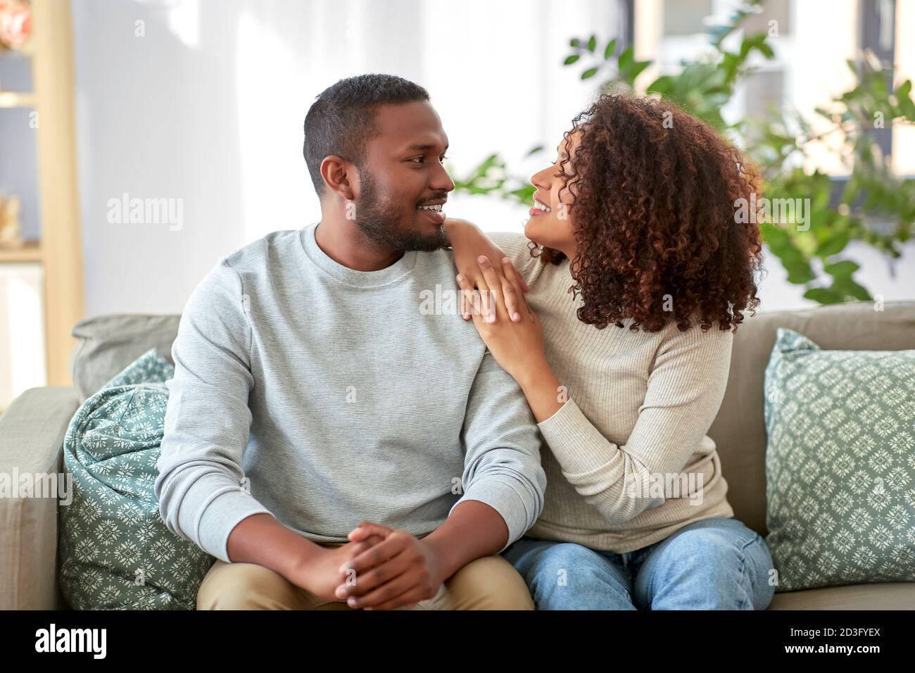happy african american couple talking at home Stock Photo - Alamy