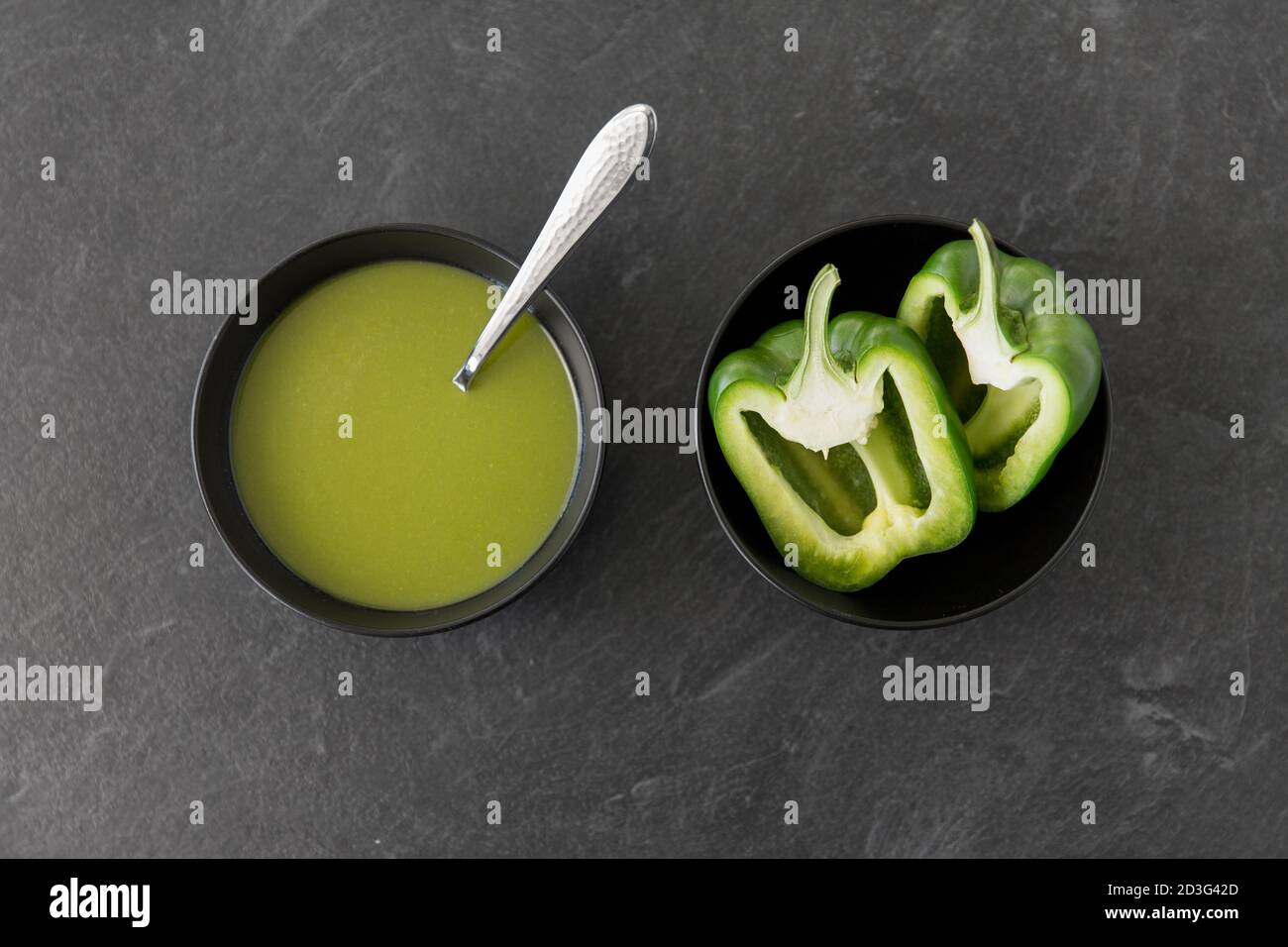 green pepper or paprika cream soup in bowl Stock Photo