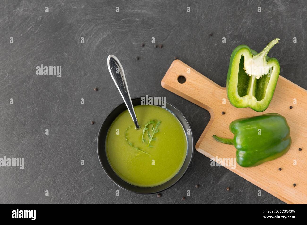 green pepper or paprika cream soup in bowl Stock Photo
