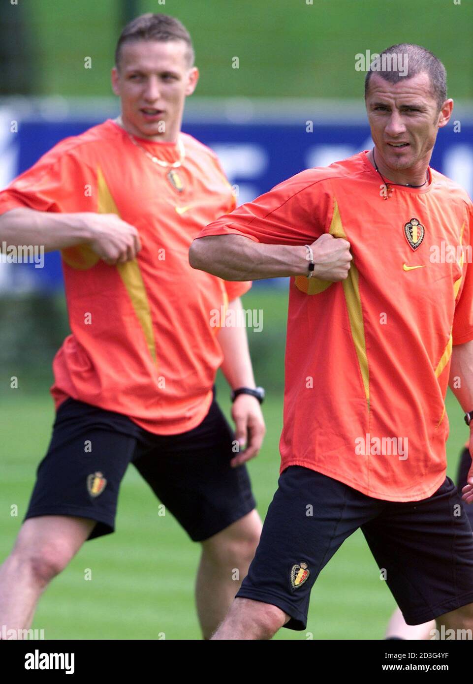 Belgian international players Danny Boffin (R) and Wesley Sonck (L) practice during a training session in Kraainem near Brussels May 20, 2002. Belgium will leave on Wednesday to take part in the World Cup, which takes place in South Korea and Japan in June this year. REUTERS/Francois Lenoir  FLR Stock Photo