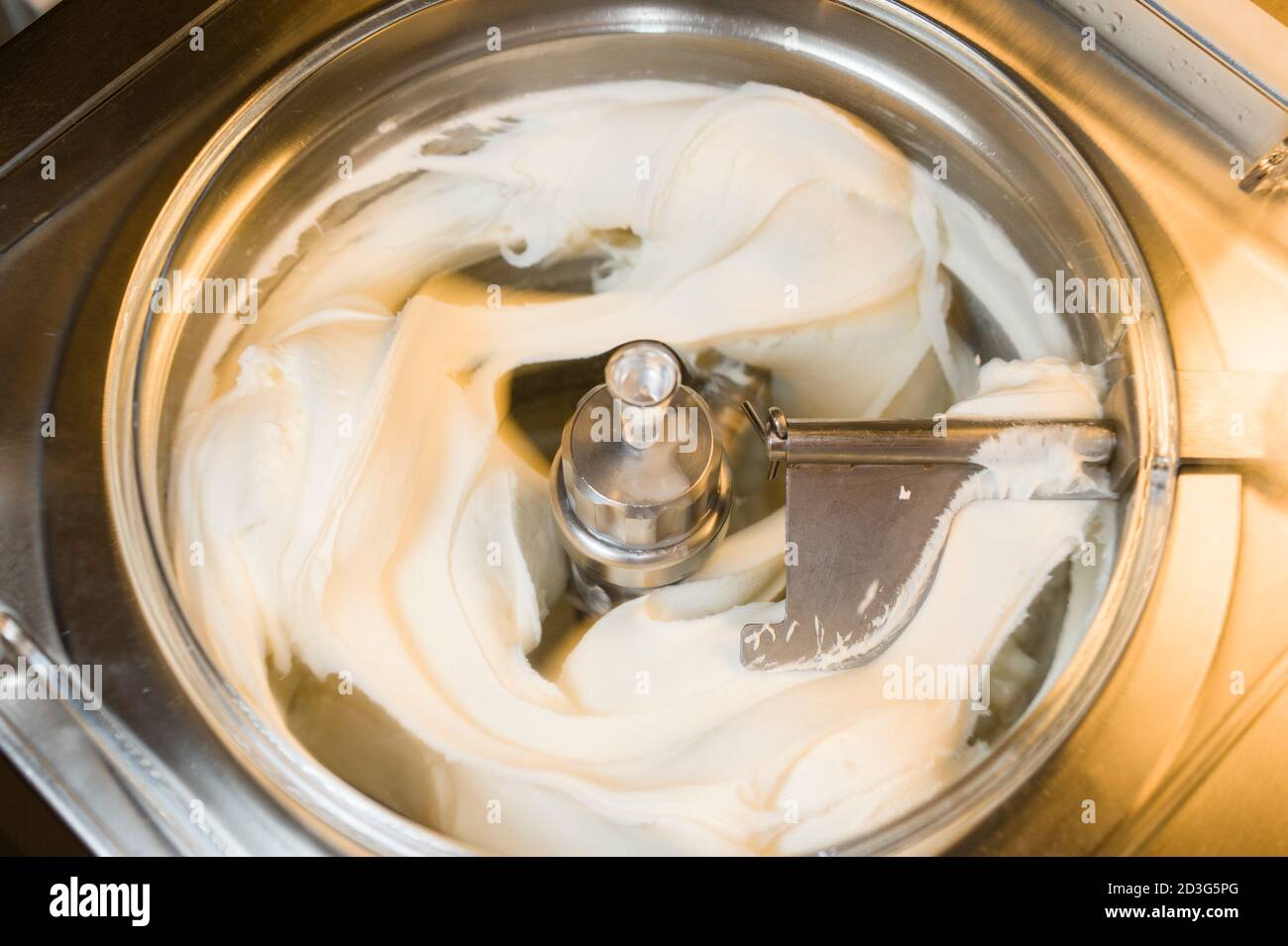 Ice cream preparation with different tools, ingredients, and machines