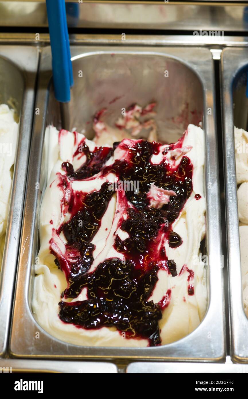 Ice cream preparation with different tools, ingredients, and machines