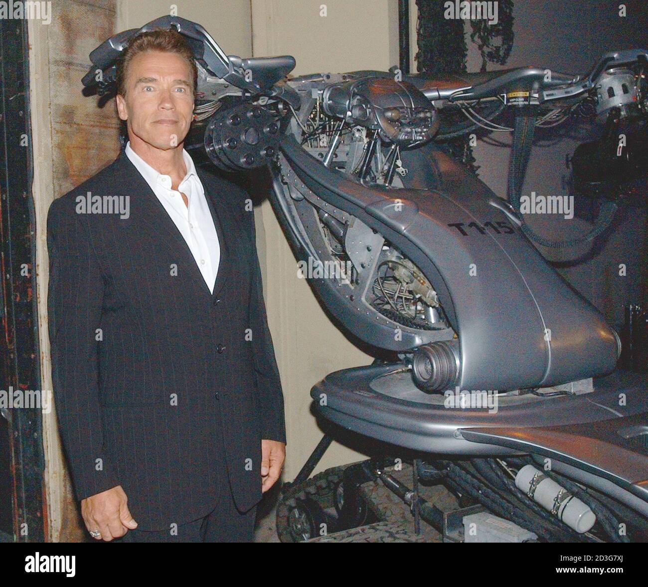 Actor Arnold Schwarzenegger A Cast Member In The Motion Picture Terminator 3 Rise Of The Machines Poses Beside An Electronic Killing Machine Depicted In The Film During Its Unveiling May 12 03 Actor Arnold Schwarzenegger A Cast Member In The Motion Picture Terminator 3 Rise Of The Machines Poses Beside An Electronic Killing Machine Depicted In The Film During Its Unveiling May 12 03