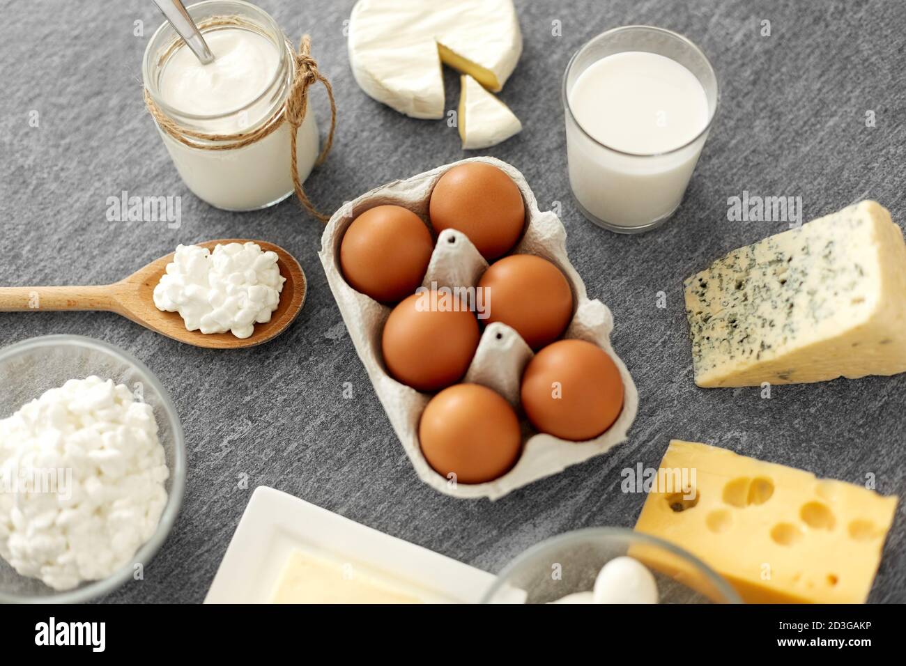 milk, yogurt, eggs, cottage cheese and butter Stock Photo