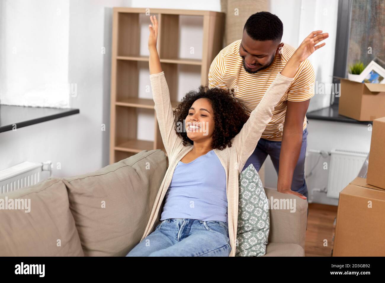 happy couple moving to new home Stock Photo - Alamy