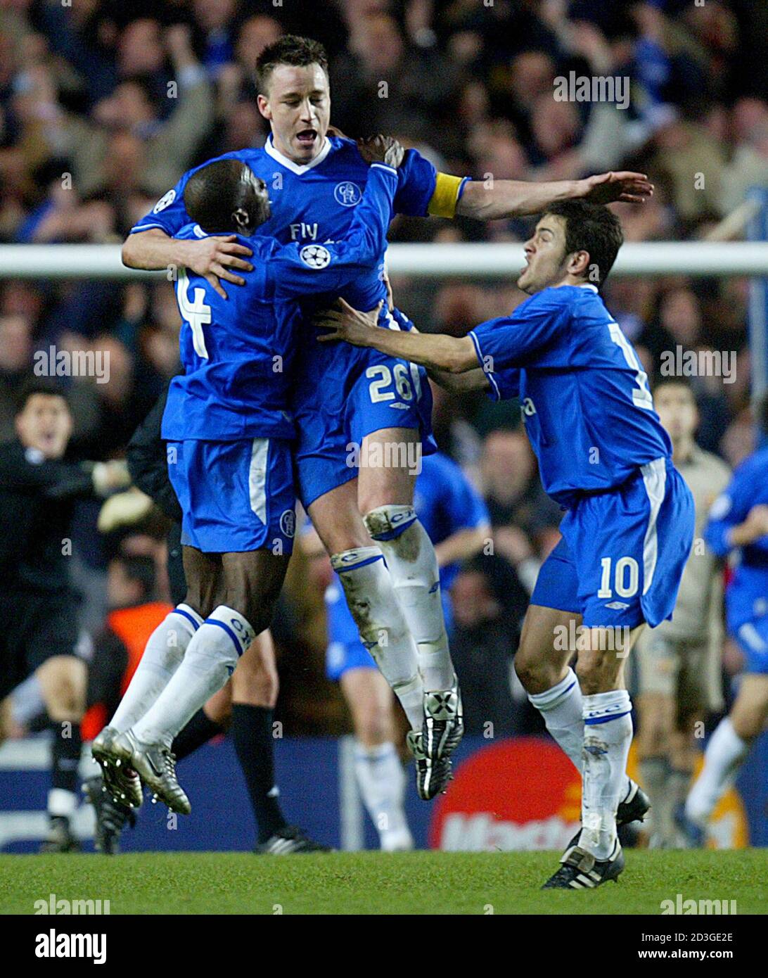 Chelsea S John Terry Celebrates Scoring With Joe Cole R And Claude Makelele L Against Barcelona During Their Champions League First Knockout Round Second Leg Match At Stamford Bridge London March 8 05