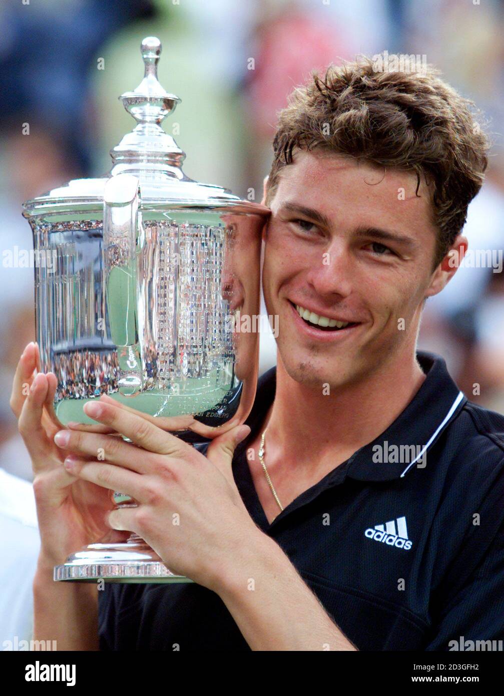 Russia's Marat Safin holds the trophy following his victory over American  Pete Sampras during the finals of the U.S. Open in New York, September 10.  Safin won the match 6-4 6-3 6-3