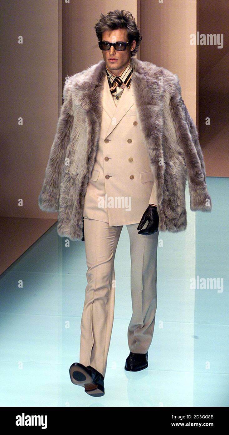 A model wears an outfit as part of Gianni Versace Autumn/Winter  ready-to-wear men's collection 2001 in Milan January 14, 2001. The Milan  fashion show will run until January 18. ML/CLH Stock Photo -
