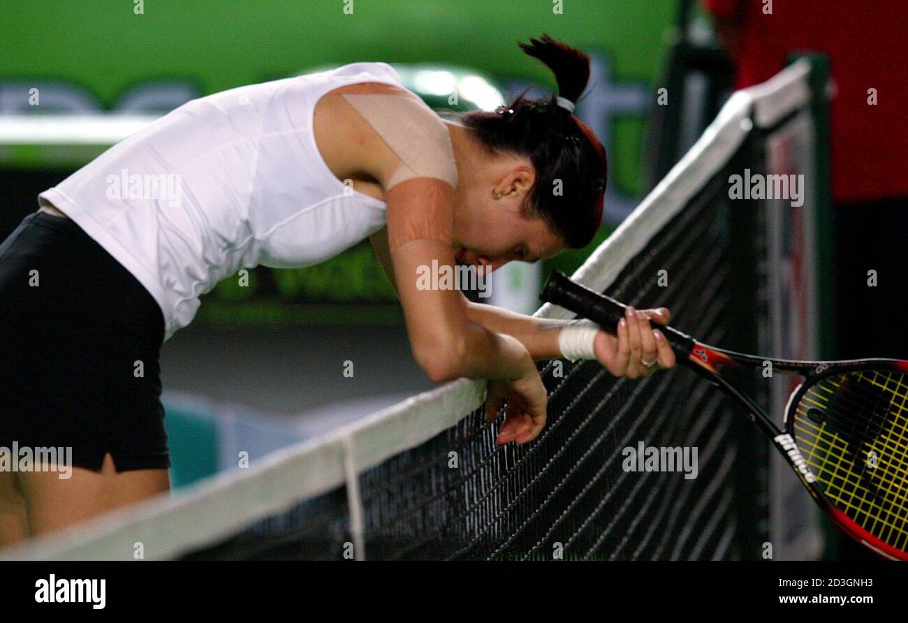Anastasia Myskina of Russia reacts after losing a point during her match against Chanda Rubin of the United States at the Hong Kong Ladies Tennis Challenge January 3, 2003. Rubin won 6-4 6-3. REUTERS/Kin Cheung  KC/CRB Stock Photo