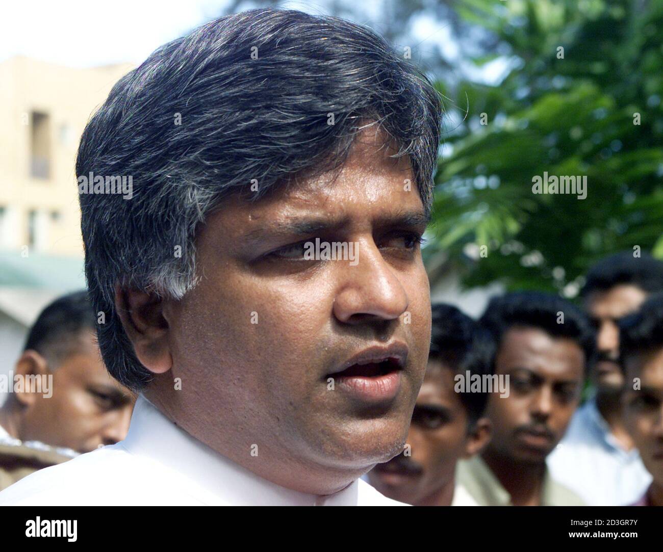 World Cup winning former Sri Lankan captain Arjuna Ranatunga walks into where the Board of Control for Cricket in Sri Lanka (BCCSL) elections are being held in Colombo on June 6, 2003. Former Sri Lanka cricket board (BCCSL) president Thilanga Sumathipala is favourite to return to the post after the first elections in three years on Friday. Captain of Sri Lanka's 1996 World Cup winning team, Arjuna Ranatunga, is standing against Sumathipala for the presidency. REUTERS/Anuruddha Lokuhapuarachchi  AL/CP Stock Photo
