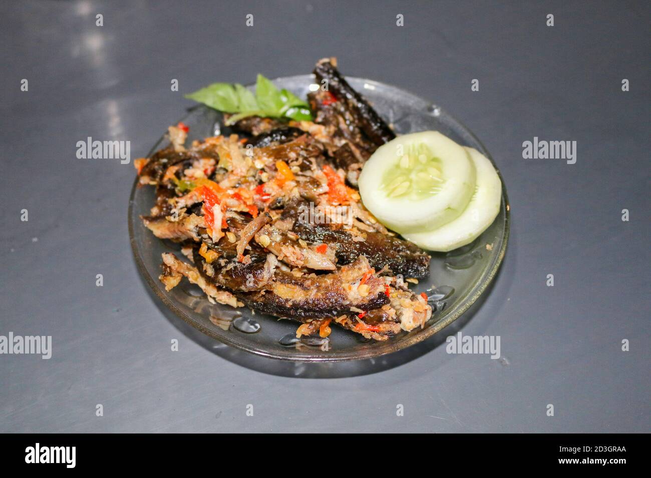 Sambal Belut or Spicy Fried Eel Delicious traditional food from Indonesia made from Eel and Chilies. Stock Photo