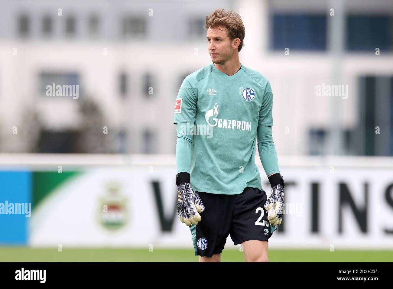 08 October 2020, North Rhine-Westphalia, Gelsenkirchen: Football: Test matches, FC Schalke 04 - SC Paderborn in the Parkstadion. Schalke's goalkeeper Frederik Rönnow is on the pitch. Photo: Guido Kirchner/dpa - IMPORTANT NOTE: In accordance with the regulations of the DFL Deutsche Fußball Liga and the DFB Deutscher Fußball-Bund, it is prohibited to exploit or have exploited in the stadium and/or from the game taken photographs in the form of sequence images and/or video-like photo series. Stock Photo