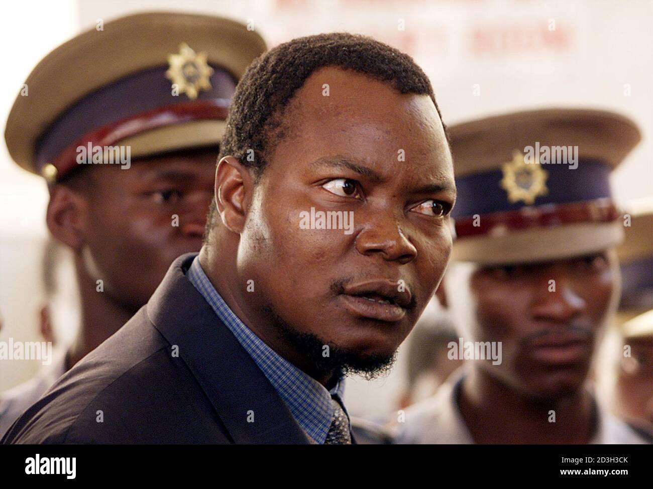Job Sikhala, opposition Movement for Democratic Change (MDC) Member of Parliament and head of MDC security, is denied entrance to the High Court by policement May 7, 2001. Sikhala was at the court for the start of MDC President Morgan Tsvangirai's case of terrorism charges under the Law and Order Maintenance Act, for allegedly calling for the violent removal of President Robert Mugabe, which is legislation introduced by the Rhodesian regime. Tsvangirai's defence has appealed to the High Court to have the case heard by the Supreme Court. HB/CRB Stock Photo