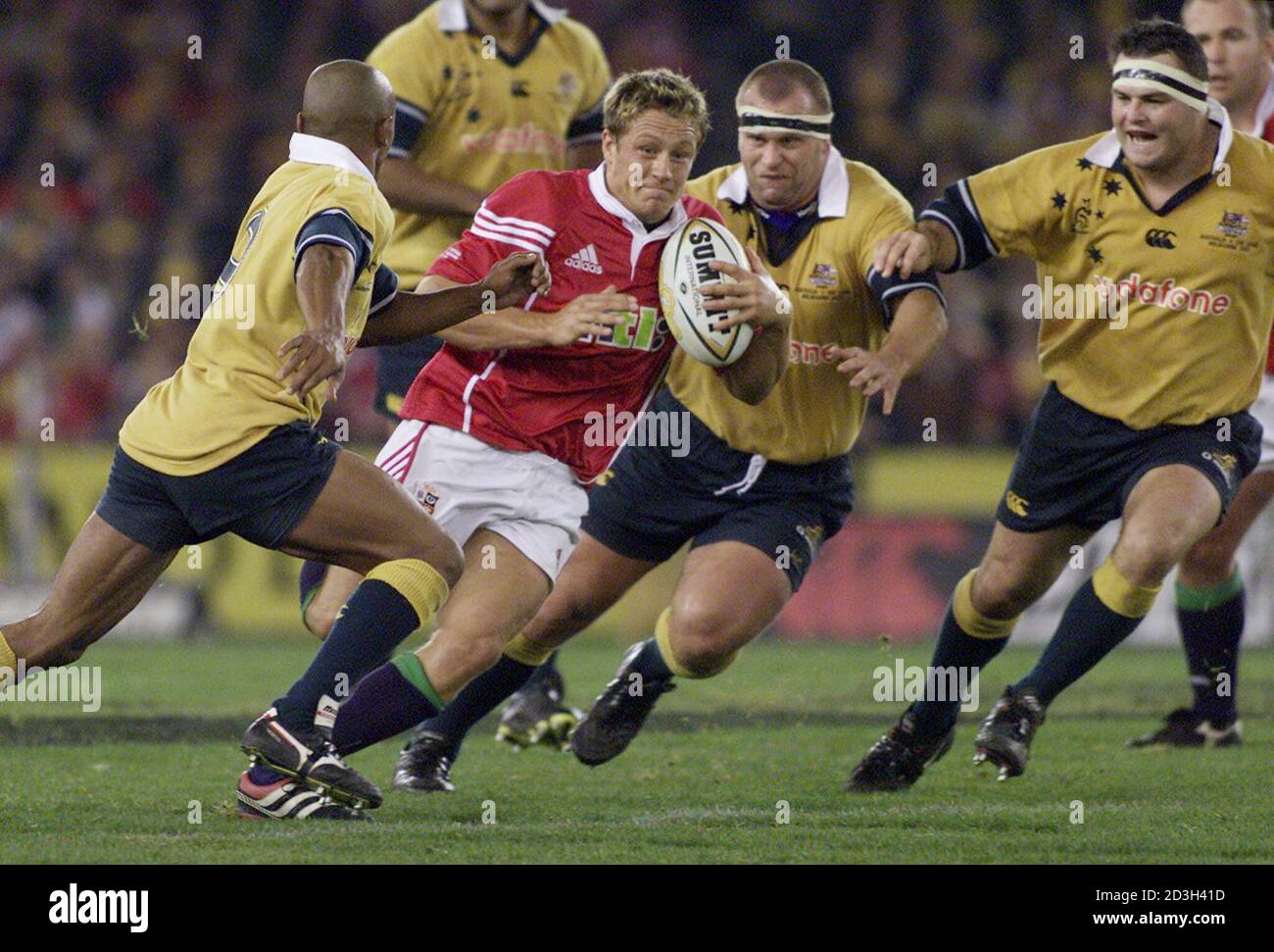 British And Irish Lions Player Jonny Wilkinson 2nd L Makes A Break As Australia S George Gregan