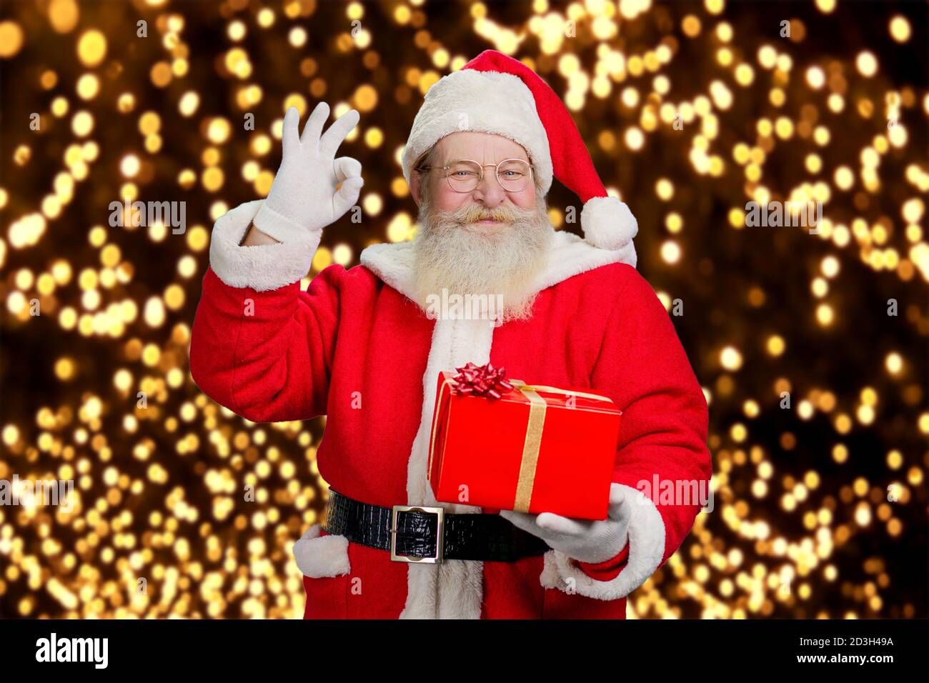 Authentic Santa Claus with okey gesture. Stock Photo