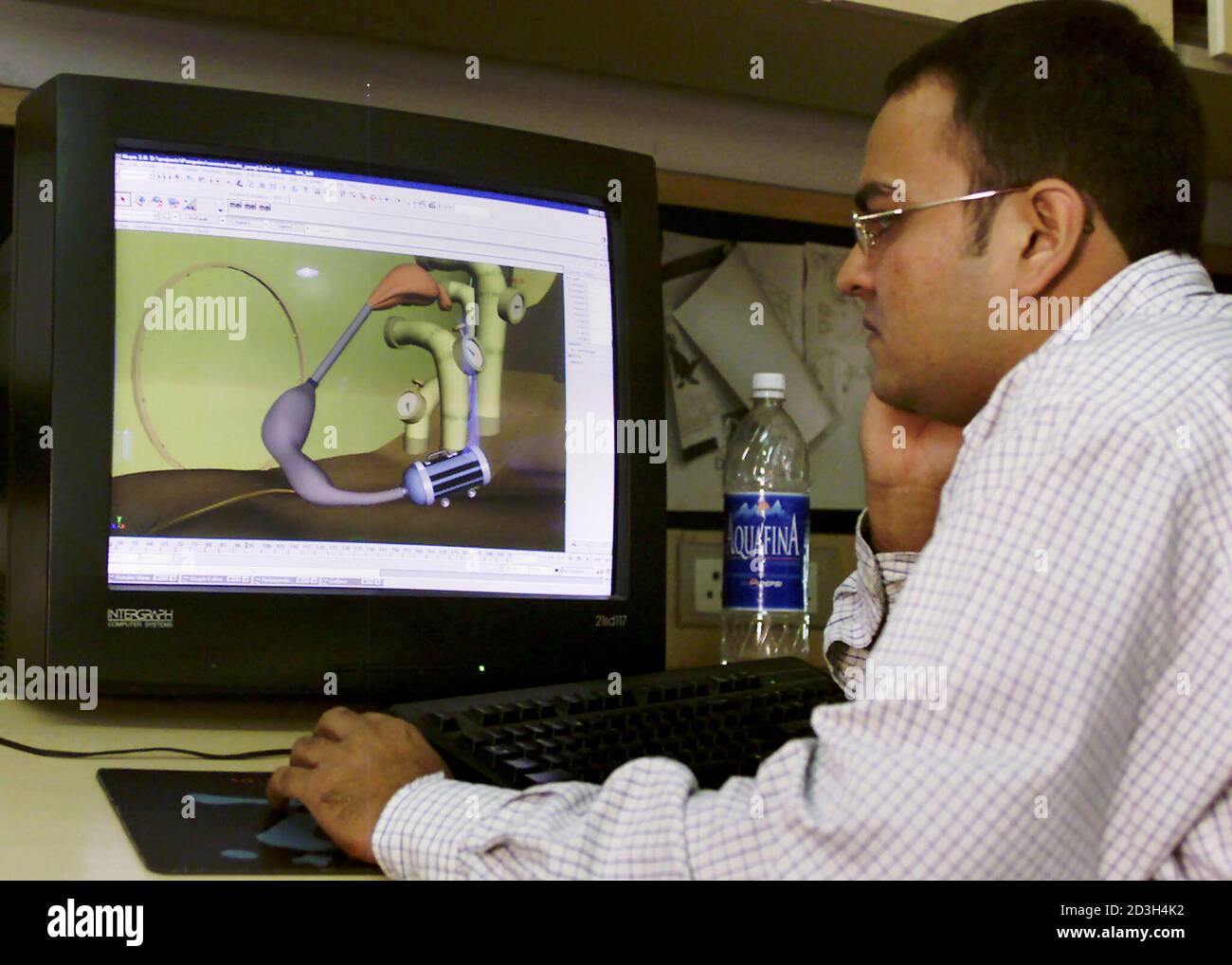 An animator at Crest House in central Bombay works on an image, September  11, 2001. The 70-odd animators at Crest House, almost all in their  twenties, may soon be working on an