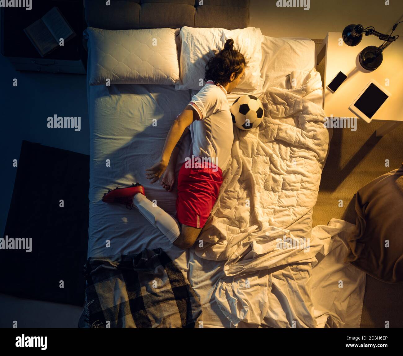 Comfort. Top view of young professional football, soccer player