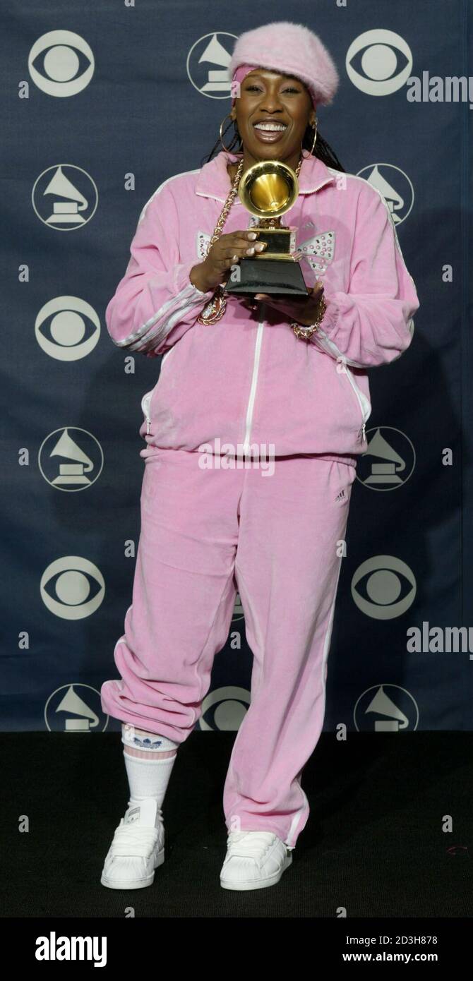 Rap singer Missy Elliott poses with the Grammy Award she won for Best