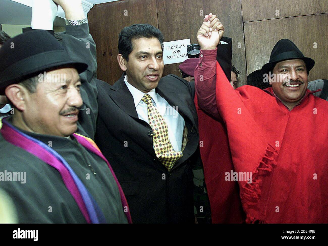 Miguel Lluco A Member Of The Pachakutik Party L Ecuadorean President Lucio Gutierrez C And Leonidas Iza President Of The Confederation Of Indian Nationalities Of Ecuador Conaie Are Seen On This File