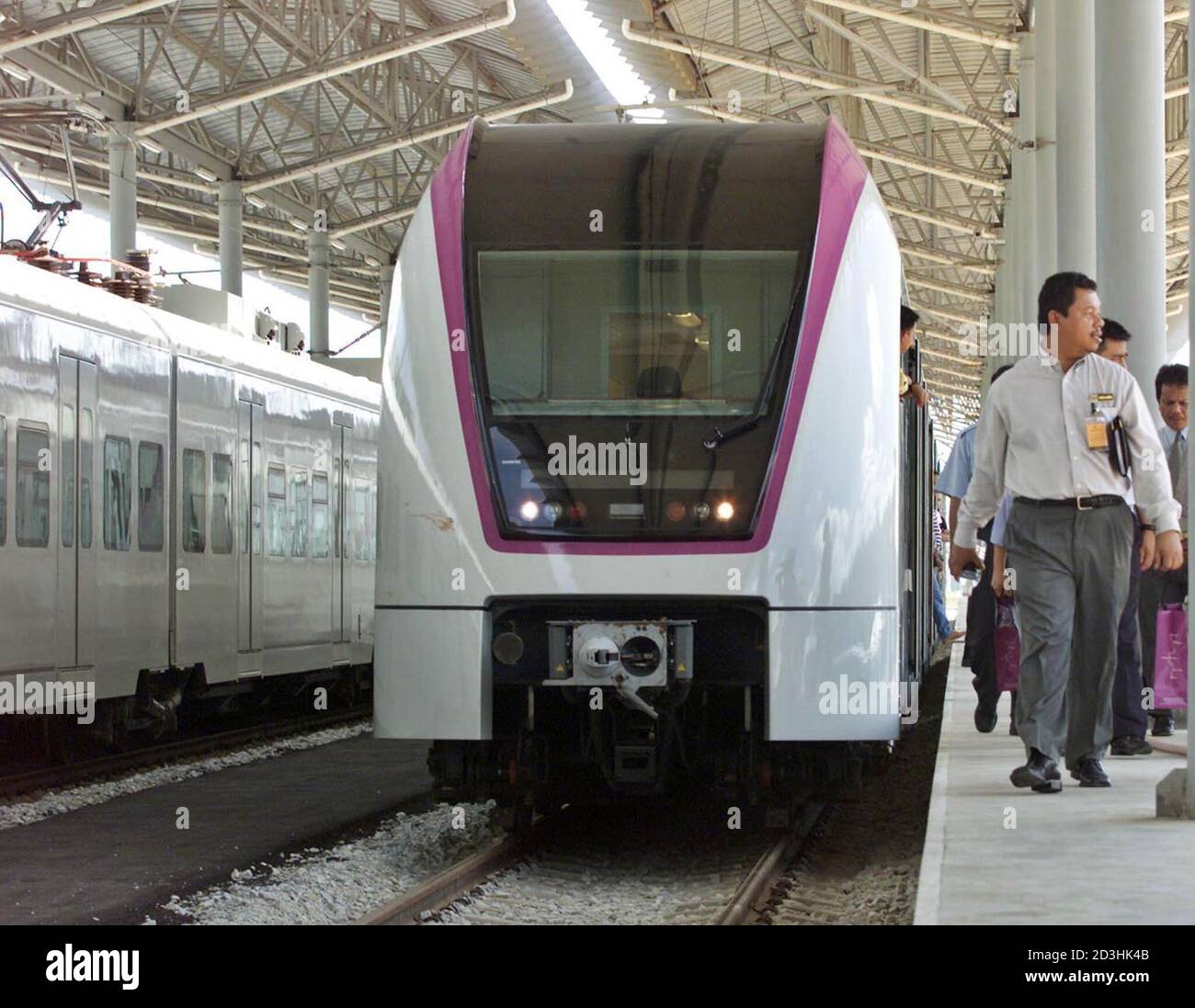 Passengers Disembark From The New Klia Express Train During A Trial Run At Its Station Depot In Salak Tinggi January 12 2002 Express Rail Link Or Erl Is A Rail Air Connection Train