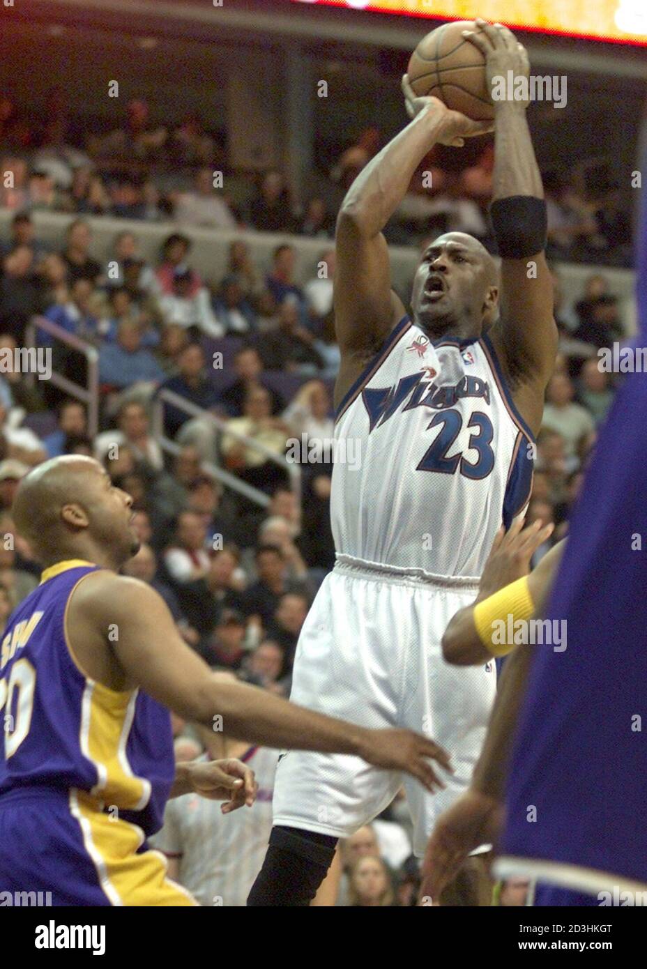 washington-wizards-michael-jordan-23-shoots-overtop-of-los-angeles-lakers-brian-shaw-for-his-only-two-points-of-the-game-during-first-half-action-in-washington-april-2-2002-the-two