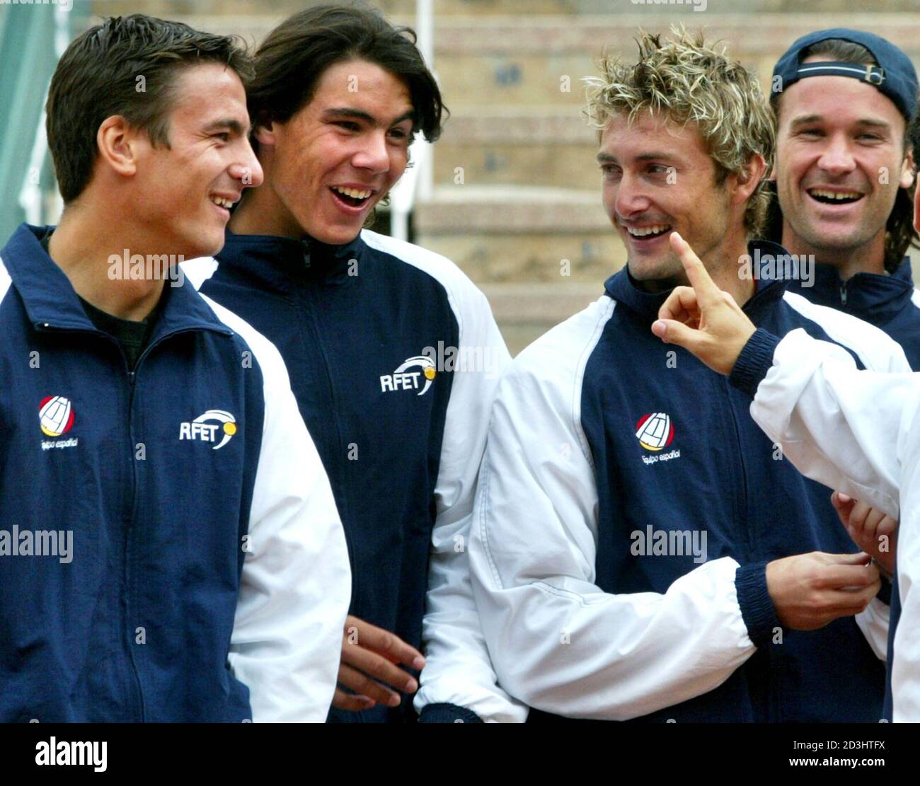 L-R: Members of the Spanish Davis Cup team Tommy Robredo, Rafael Nadal,  Juan Carlos Ferrero and Carlos Moya joke during the draw for the  quarter-final Davis Cup tie at Palma de Mallorca's