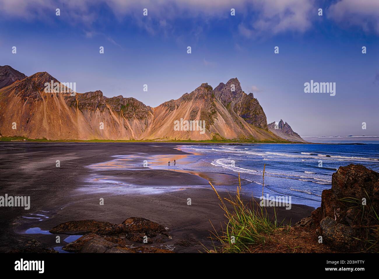 The wild and beautiful Vestrahorn mountain in early evening hours - Höfn, Iceland Landscape Stock Photo