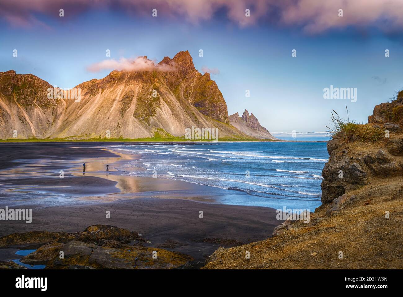 The wild and beautiful Vestrahorn mountain in early evening hours - Höfn, Iceland Landscape Stock Photo