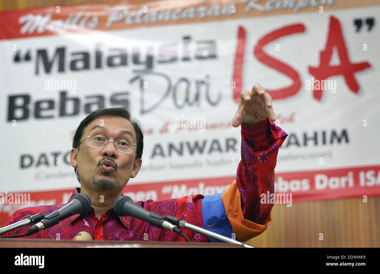 Against A Banner Saying Malaysia Free Of Internal Security Act Isa Malaysian Opposition Figure Anwar Ibrahim