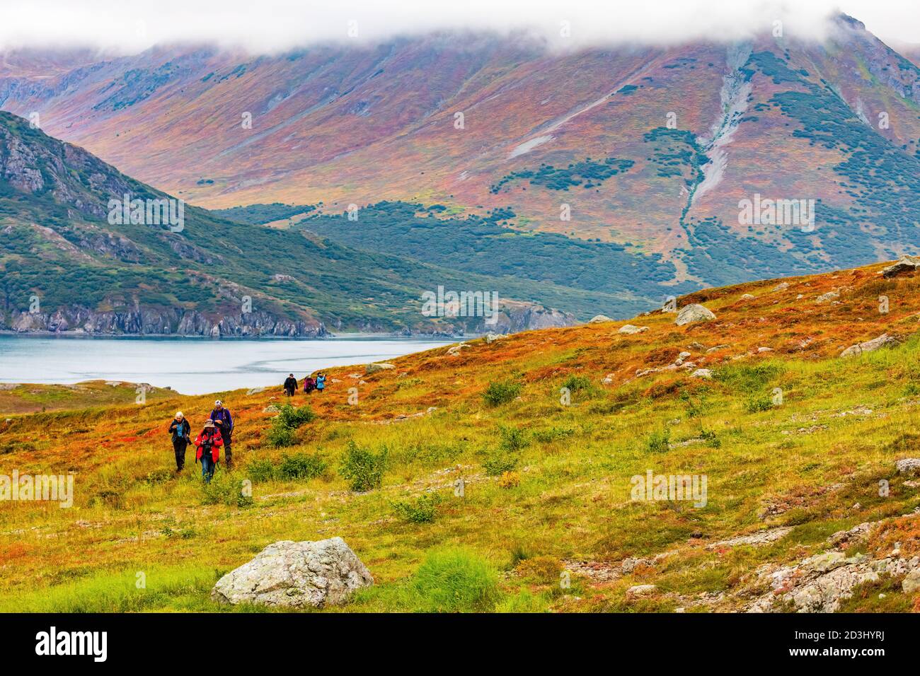 Hikers at Bukhta Petra, Russian Far East Stock Photo