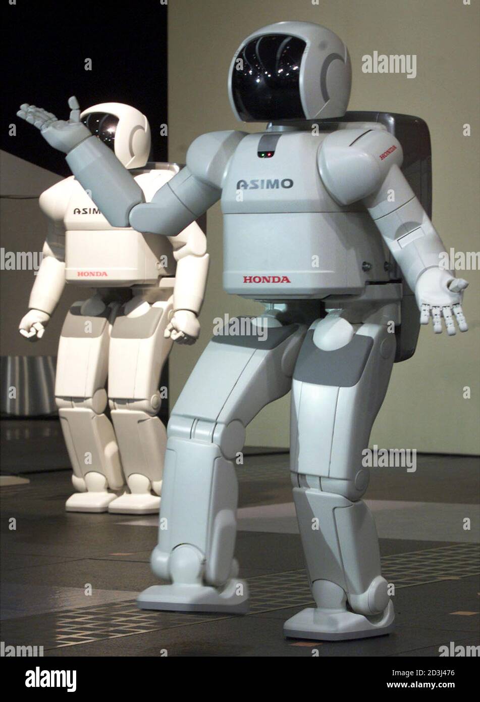 Honda Motor S Humanoid Robot Asimo Raises A Hand And Moves Some Fingers As It Says What Do You Want In Response To A Request To Turn Around During A Demonstration At Honda